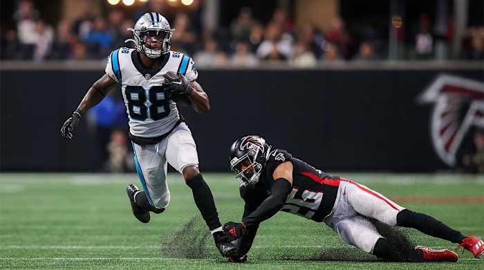 Oct 30, 2022; Atlanta, Georgia, USA; Carolina Panthers wide receiver Terrace Marshall Jr. (88) runs past Atlanta Falcons cornerback Isaiah Oliver (26) in the second half at Mercedes-Benz Stadium.